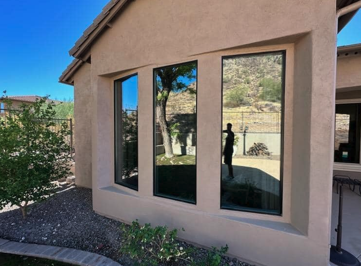 Streak-free glass with Lake Travis reflections after cleaning