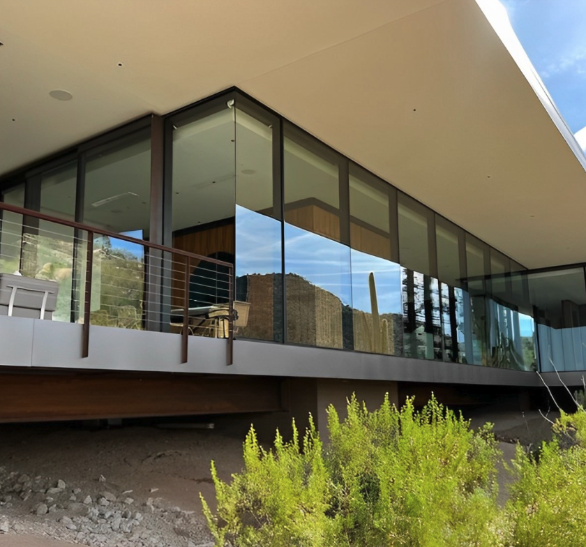 Cable-rail glass balcony cleaned on a modern Texas Hill Country home