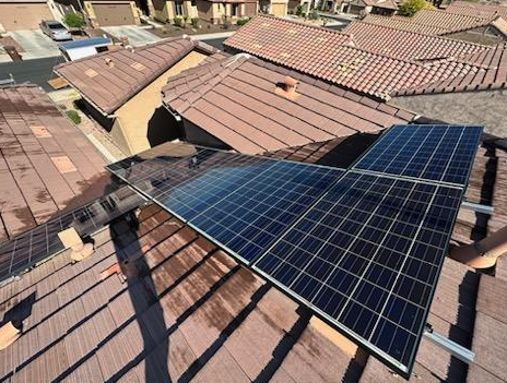 Residential solar panels cleaned on a metal roof in the Hill Country
