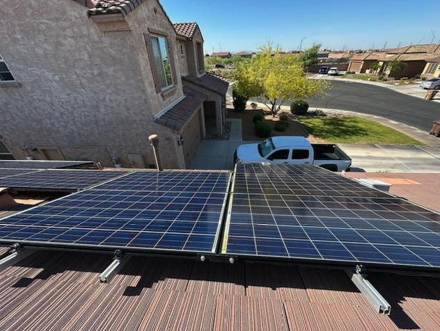 Solar panel cleaning on a two-story Lakeway home