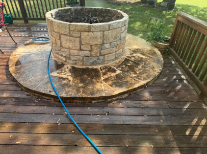 Stone Fire Pit Deck before pressure washing